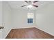 Cozy bedroom with wood-look floors, a ceiling fan, and a window that provides natural light at 3049 Park West Blvd, Mount Pleasant, SC 29466