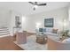 Cozy living room with hardwood floors, comfortable seating, and stylish decor at 3049 Park West Blvd, Mount Pleasant, SC 29466