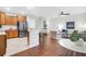 Spacious kitchen and living area featuring bar seating, stainless appliances, and modern finishes at 3049 Park West Blvd, Mount Pleasant, SC 29466