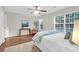 Comfortable bedroom featuring hardwood floors, natural light, and ceiling fan at 3049 Park West Blvd, Mount Pleasant, SC 29466