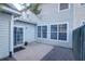Patio with a table and chairs adjacent to exterior walls and a privacy fence at 3049 Park West Blvd, Mount Pleasant, SC 29466