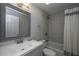 Bathroom features a vanity, mirror, and tiled shower/tub combination at 318 Hollywood Dr, Charleston, SC 29407