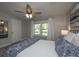 Bedroom featuring a window with natural light, ceiling fan, and neutral wall color at 318 Hollywood Dr, Charleston, SC 29407