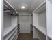 Walk-in closet with built-in shelving, drawers, and ample storage space for shoes, clothing, and accessories at 318 Hollywood Dr, Charleston, SC 29407