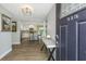 Inviting foyer with wood floors and an open view of the updated kitchen at 318 Hollywood Dr, Charleston, SC 29407
