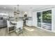 Updated kitchen with white cabinets, stainless steel appliances, and an island with seating at 318 Hollywood Dr, Charleston, SC 29407