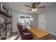 Office space features a desk, built-in bookshelves, and a comfortable leather chair at 318 Hollywood Dr, Charleston, SC 29407