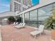 Brick patio with lounge chairs and views of the intercoastal waterway at 330 Concord St # 7 A, Charleston, SC 29401