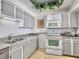 Kitchen featuring stainless steel appliances and neutral cabinets and countertops at 330 Concord St # 7 A, Charleston, SC 29401