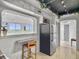 Kitchen area featuring a countertop, stainless refrigerator and breakfast bar at 330 Concord St # 7 A, Charleston, SC 29401