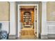 Library with wooden floors, bookcase, and a view adds a touch of charm to the space at 330 Concord St # 7 A, Charleston, SC 29401