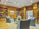 Beautiful library with hardwood walls and built-in bookshelves, creating a perfect retreat at 330 Concord St # 7 A, Charleston, SC 29401