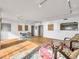 Open living room with hardwood floors, seating, and view into kitchen at 330 Concord St # 7 A, Charleston, SC 29401