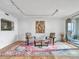 Living room featuring eclectic rug and furnishings with access to the balcony at 330 Concord St # 7 A, Charleston, SC 29401