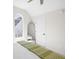 Bedroom features an arched window, a ceiling fan, and a full length mirror at 350 Arlington Dr, Charleston, SC 29414