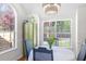 Charming breakfast nook featuring a round table, natural light, and views of the beautiful outdoor scenery at 350 Arlington Dr, Charleston, SC 29414