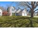 Beautiful home with well-maintained lawn and mature tree, complemented by a two-car garage and inviting curb appeal at 350 Arlington Dr, Charleston, SC 29414