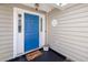 Charming entrance featuring a vibrant blue door, stylish house number, and a cozy 'Welcome' mat at 350 Arlington Dr, Charleston, SC 29414