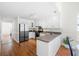 Spacious kitchen with white cabinetry, modern appliances, and wood flooring providing a warm and inviting space at 350 Arlington Dr, Charleston, SC 29414