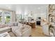 Open-concept living space with modern kitchen, dining area, and comfortable living room at 351 Claret Cup Way, Charleston, SC 29414