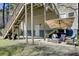 Spacious backyard featuring stairs to a deck with outdoor seating and a large, grassy area at 3651 Barton St, Johns Island, SC 29455