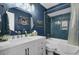 Stylish bathroom featuring vanity, framed mirrors, bathtub, and custom tile at 3651 Barton St, Johns Island, SC 29455