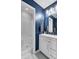 Modern bathroom featuring a white vanity, stylish mirror, and a step-in shower at 3651 Barton St, Johns Island, SC 29455