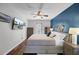 Relaxing bedroom featuring a king bed, wood floors and sliding glass door at 3651 Barton St, Johns Island, SC 29455