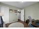 Cozy bedroom featuring a closet with paneled doors and soothing sage green walls at 3651 Barton St, Johns Island, SC 29455