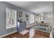Bright dining area featuring wood floors, coffee bar, and stylish chandelier at 3651 Barton St, Johns Island, SC 29455