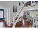 Staircase leading to an upstairs area featuring wooden steps and a bright dining area at 3651 Barton St, Johns Island, SC 29455
