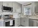 Updated kitchen featuring stainless steel appliances and backsplash at 3651 Barton St, Johns Island, SC 29455
