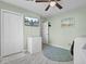 Clean laundry room with a deep freezer, white marbled floors, television, and large storage closet at 3651 Barton St, Johns Island, SC 29455