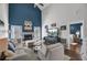 Inviting living room features a fireplace, hardwood floors, and access to the outdoors at 3651 Barton St, Johns Island, SC 29455