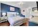 Cozy bedroom with a queen bed, soft lighting, and stylish decor accents at 3651 Barton St, Johns Island, SC 29455