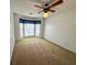Bedroom featuring a bay window with natural light and a ceiling fan, ready for personalization at 388 Benton Farm Rd, Walterboro, SC 29488