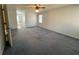 Bedroom showcasing ample space, natural light from the window, and easy access to adjacent rooms at 388 Benton Farm Rd, Walterboro, SC 29488