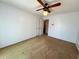 A bedroom showcases an open closet and a ceiling fan, ideal for comfortable living at 388 Benton Farm Rd, Walterboro, SC 29488