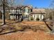 This two-story brick home features a balcony and a well-maintained front yard with mature trees at 388 Benton Farm Rd, Walterboro, SC 29488