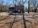 Brick house with a circular drive and mature trees and landscaping at 388 Benton Farm Rd, Walterboro, SC 29488