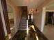 Entryway with ceramic tile floors, wallpaper, and staircase leading to the second floor at 388 Benton Farm Rd, Walterboro, SC 29488