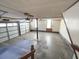 This garage features an automatic door, ample space, and natural light from windows at 388 Benton Farm Rd, Walterboro, SC 29488