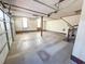 Spacious garage with an automatic door, side windows, room for storage, and stairs to upper level at 388 Benton Farm Rd, Walterboro, SC 29488