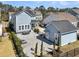 Spacious backyard featuring a stone patio, fire pit, lounge chairs, and fenced yard at 3920 Maidstone Dr, Mount Pleasant, SC 29466