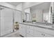 Bright bathroom featuring dual sinks, granite countertops, and a glass-enclosed shower at 3920 Maidstone Dr, Mount Pleasant, SC 29466