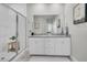 Modern bathroom with dual sinks, stylish vanity, and a glass-enclosed shower at 3920 Maidstone Dr, Mount Pleasant, SC 29466