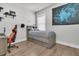 Cozy bedroom featuring a bed with built-in storage drawers, a comfy gaming chair, and modern decor for a relaxing retreat at 3920 Maidstone Dr, Mount Pleasant, SC 29466