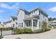 Charming home featuring light-blue siding, a cozy front porch, and manicured landscaping at 3920 Maidstone Dr, Mount Pleasant, SC 29466