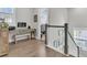 Landing with desk area, overlooking the entry and staircase to the first floor at 3920 Maidstone Dr, Mount Pleasant, SC 29466
