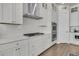Modern kitchen featuring white cabinetry, stainless steel appliances, and ample counter space for cooking and prep at 3920 Maidstone Dr, Mount Pleasant, SC 29466
